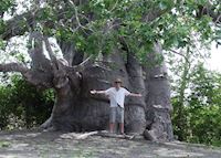 Tim next to a Baobab tree, Matemo Island, Mozambique